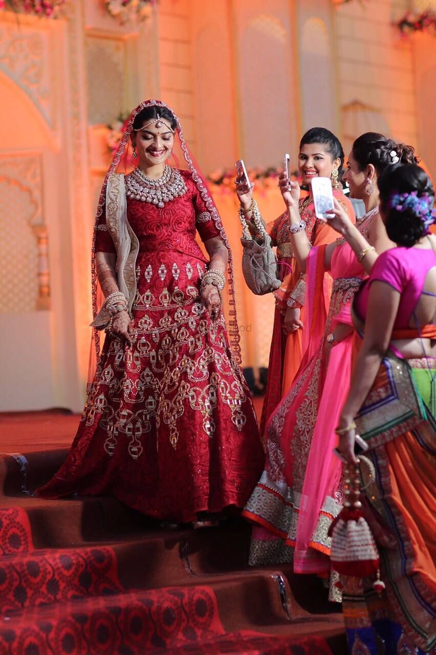 Photo of red anarkali bridal wear full sleeves with beige dupatta . threadowrk