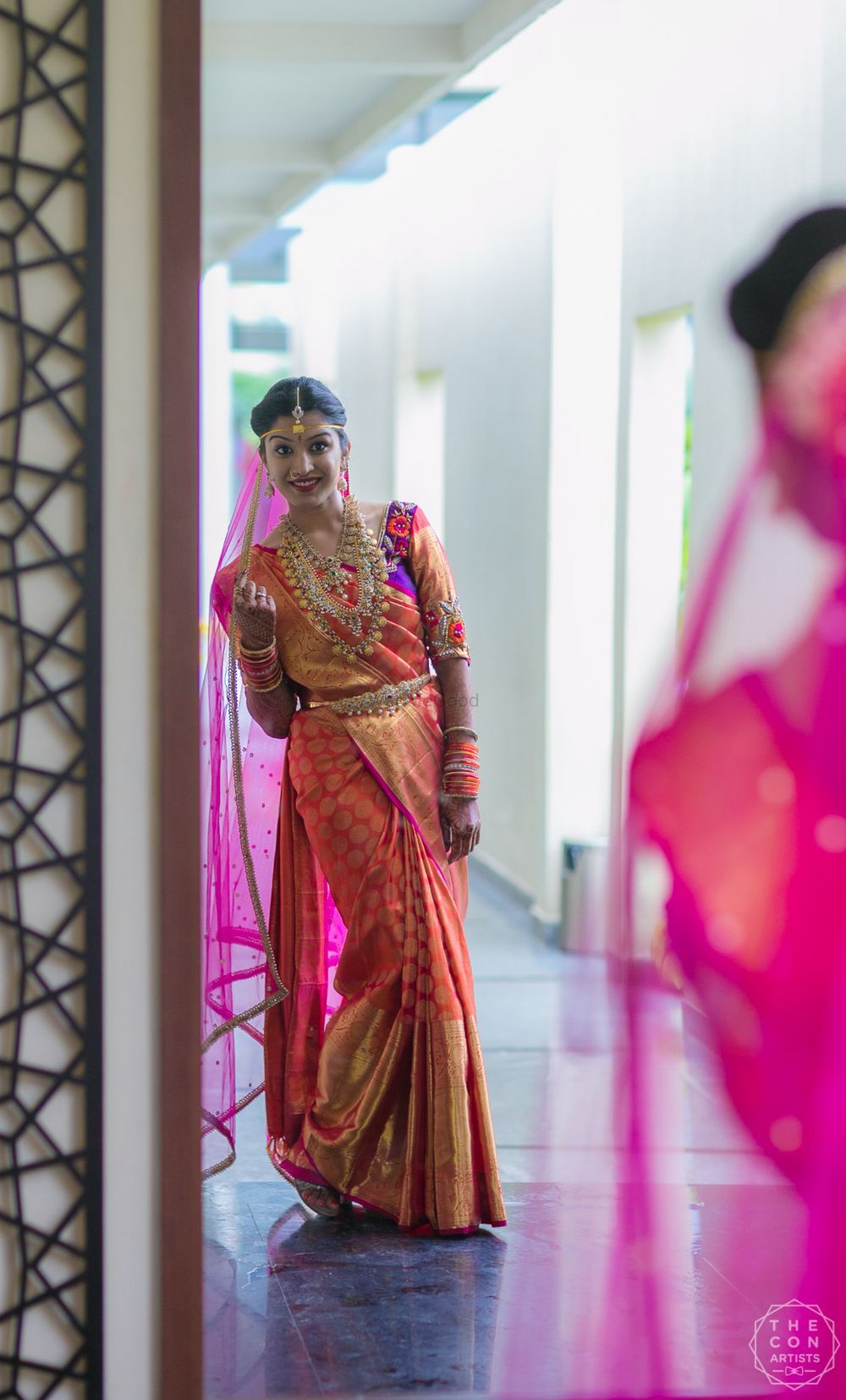 Photo of South indian bride in red and gold kanjivaram saree