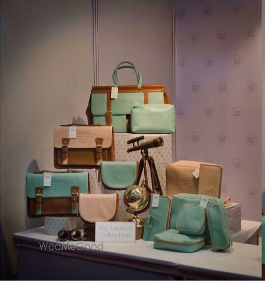 Photo of mint and beige luggage