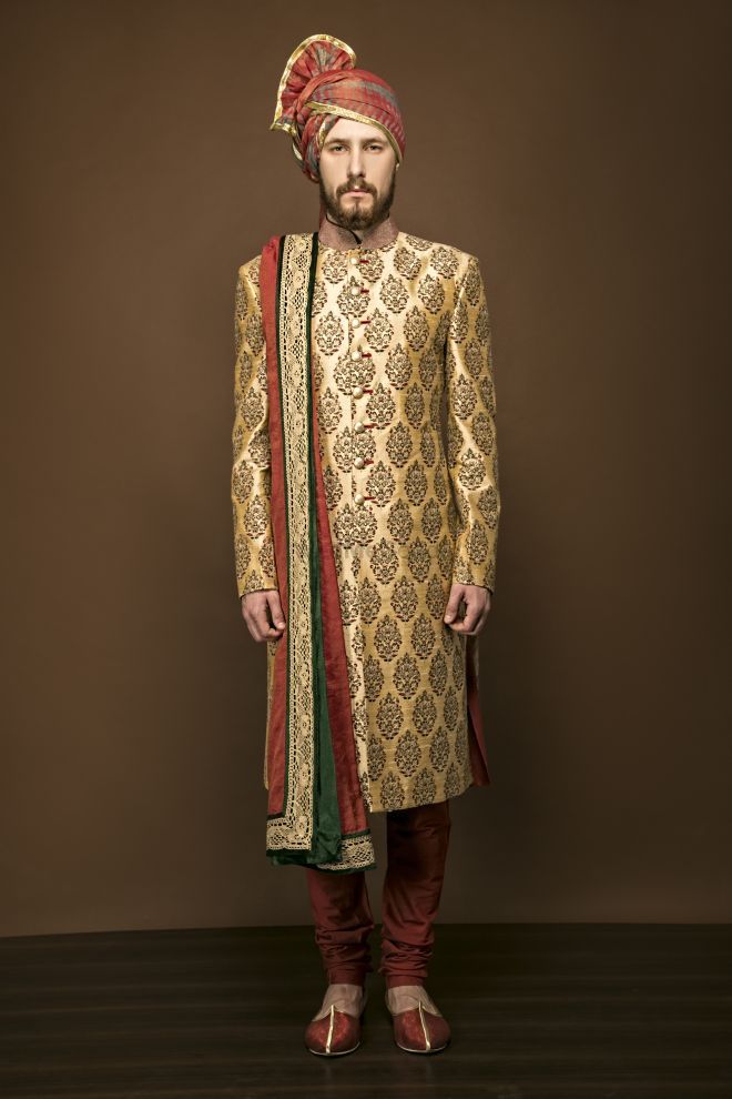 Photo of Gold and maroon sherwani with large motifs
