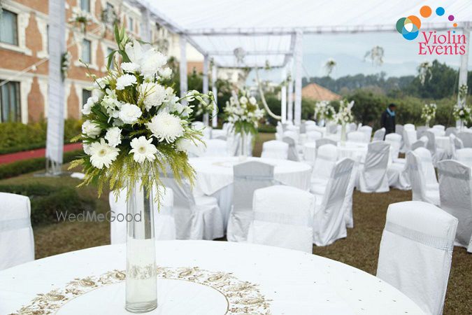 Photo of White theme table setting decor