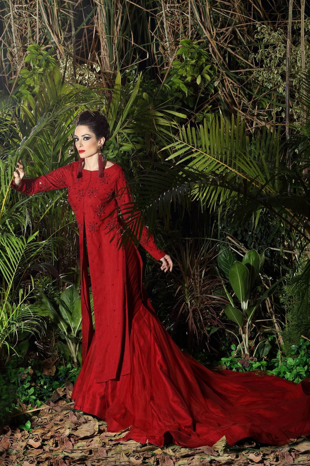 Photo of Maroon gown with panels and train
