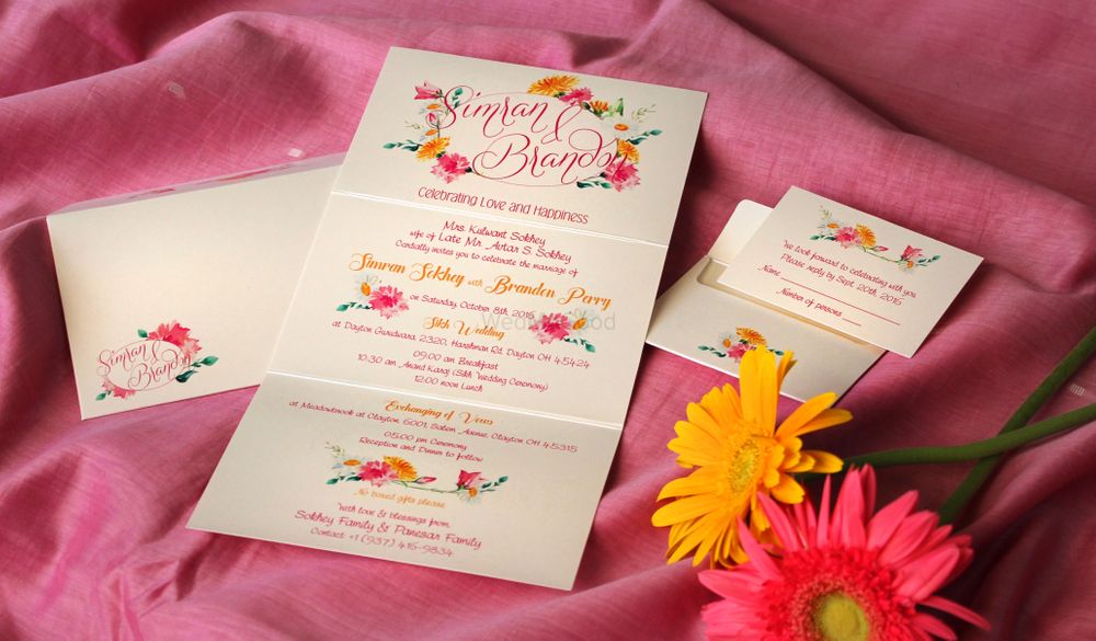 Photo of Simple wedding card with floral design