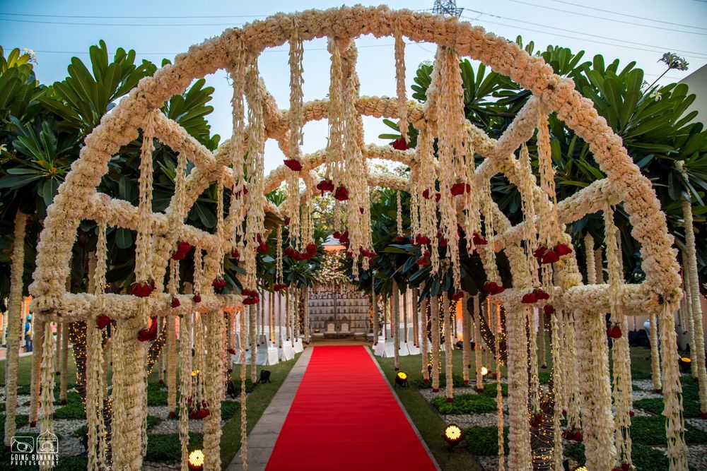 Photo of White floral frame entrance decor for wedding