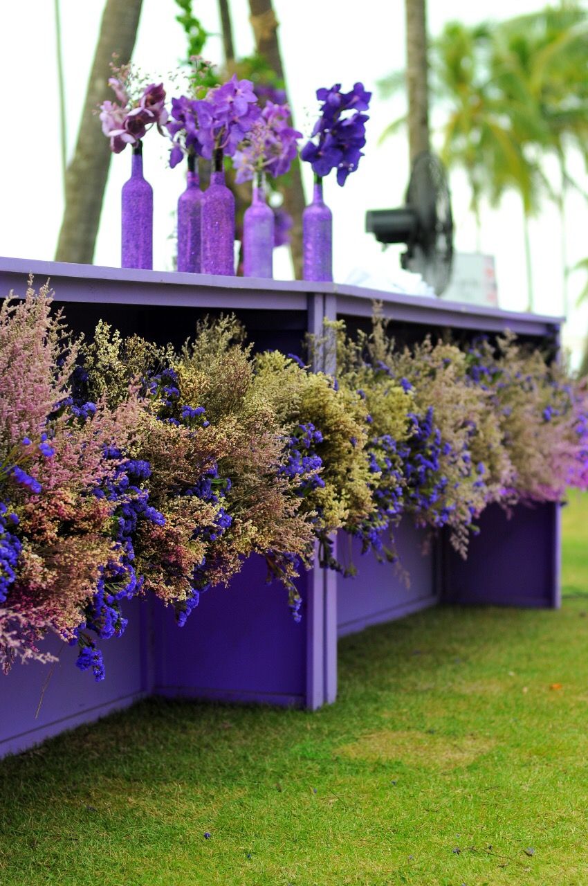 Photo of Purple theme corner decor arrangement