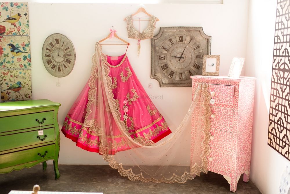 Photo of bright candy pink lehenga for sangeet or engagement in net with large motif