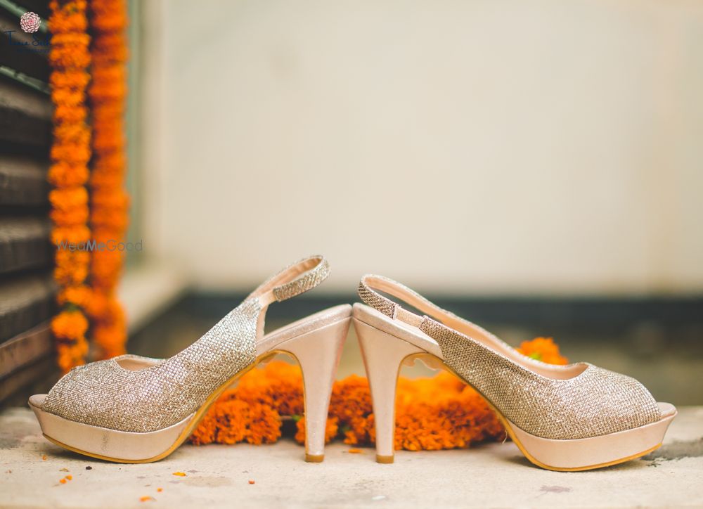 Photo of Silver bridal heels to wear under red lehenga