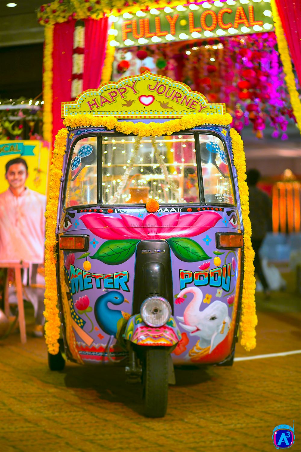 Photo of Genda phool autorickshaw as prop