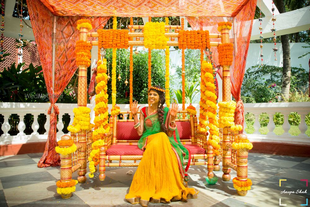 Photo of genda flower mehendi swing decor