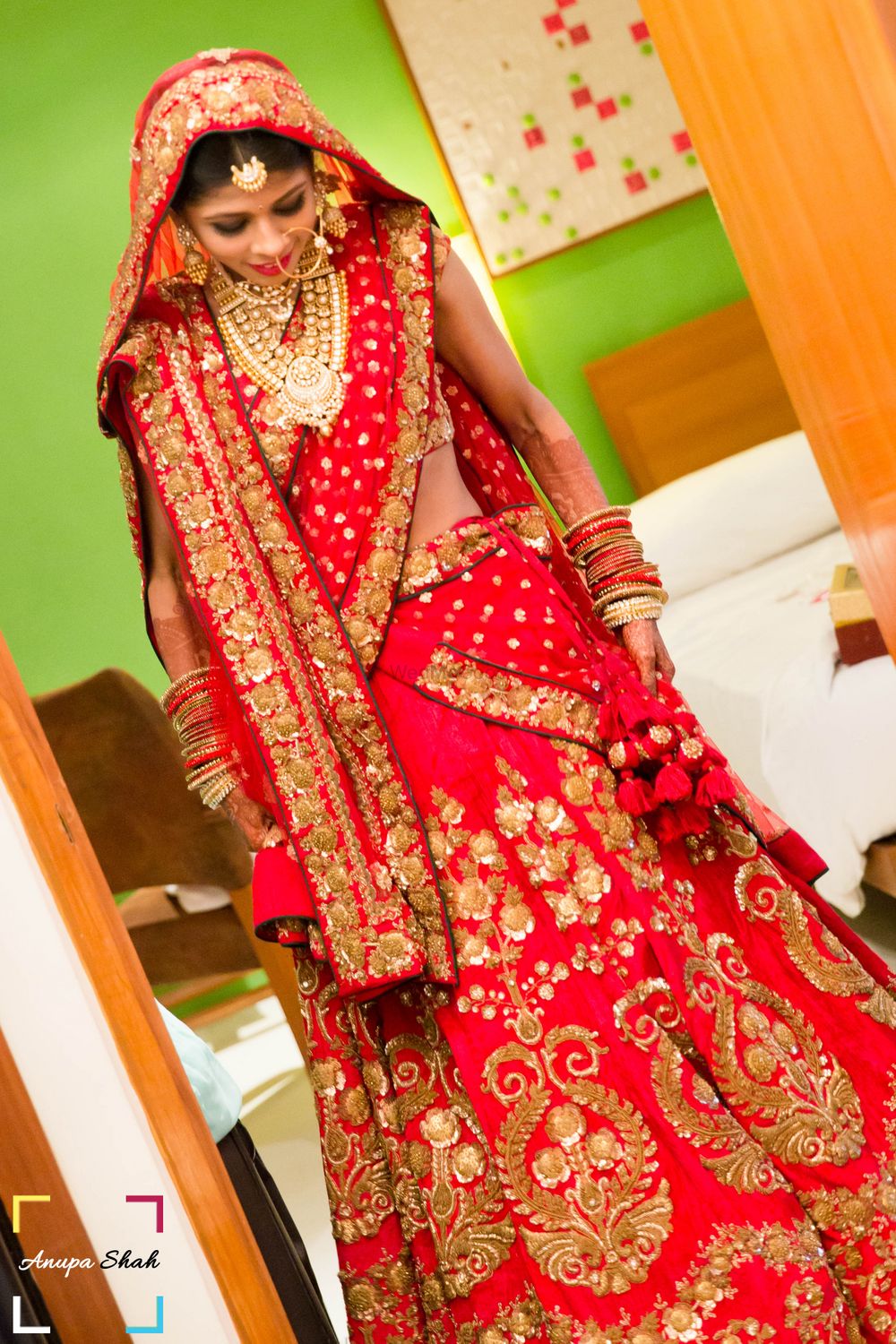 Photo of crimson red bridal lehenga
