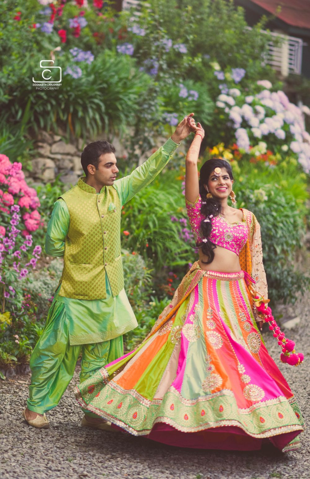 Photo of multi colored mehendi lehenga