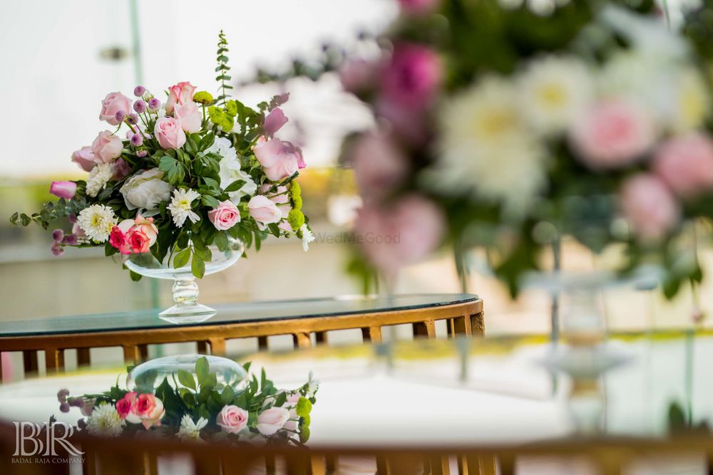 Photo of glass vase with florals for centrepiece