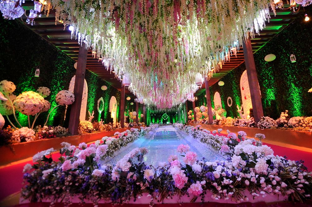 Photo of Floral aisle with hanging floral ceiling