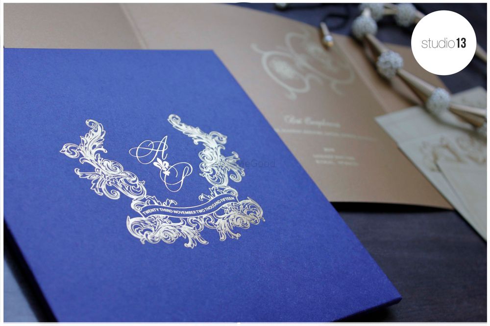 Photo of blue and gold invitations