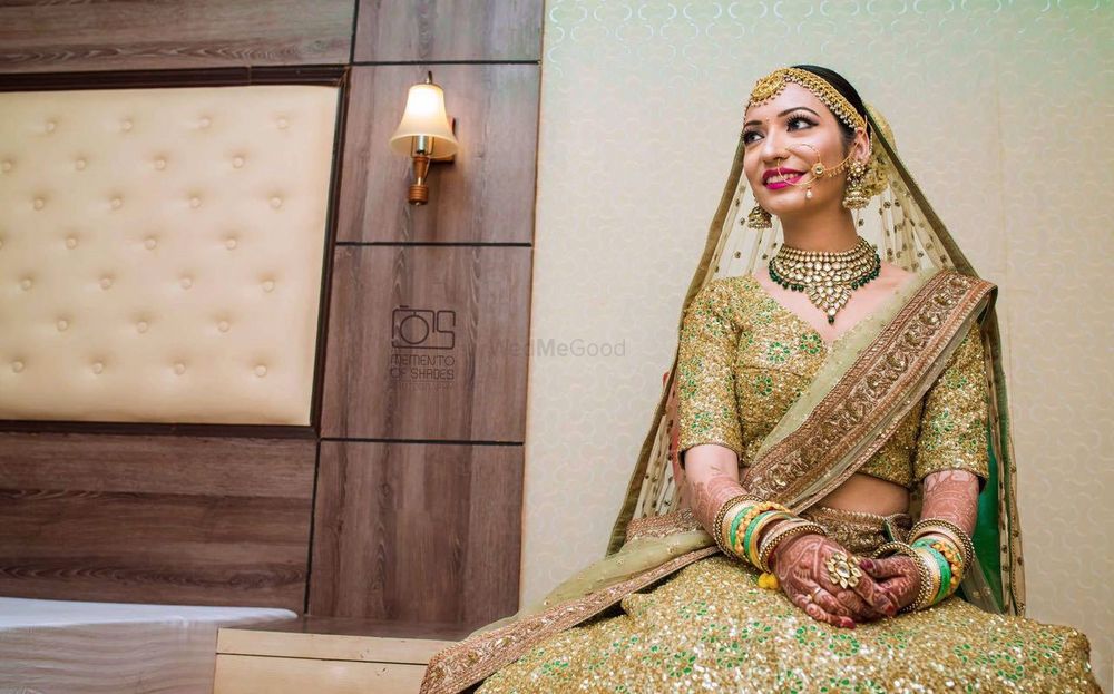 Photo of Green and gold sequin bridal lehenga