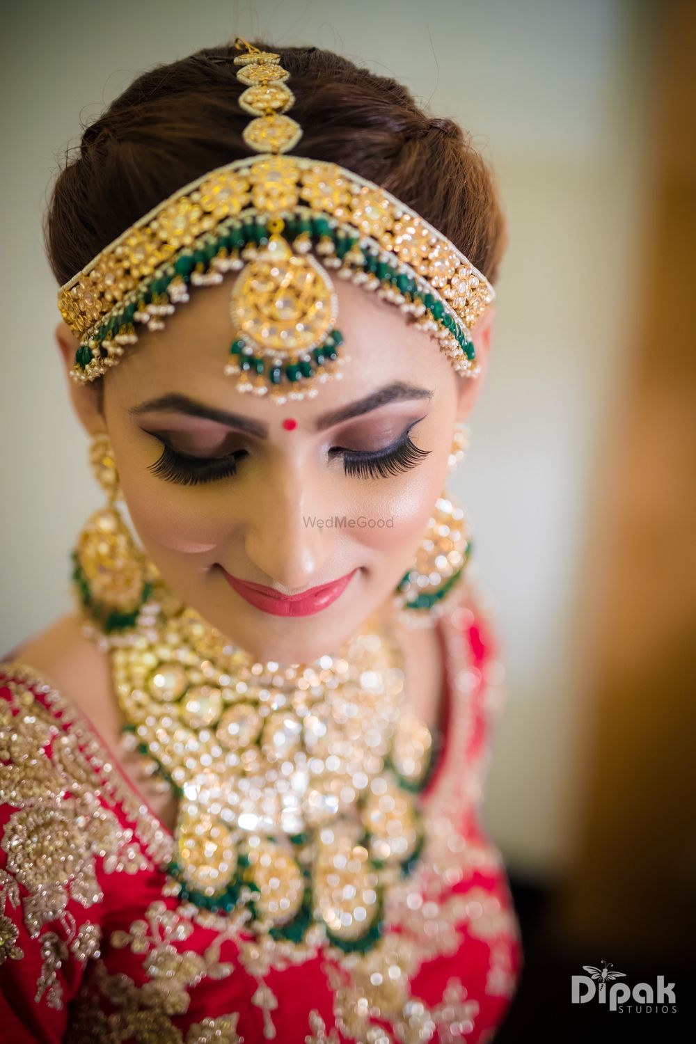 Photo of Green and gold bold bridal jewellery