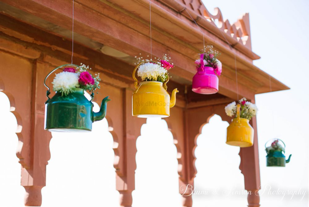 Photo of hanging floral kettles