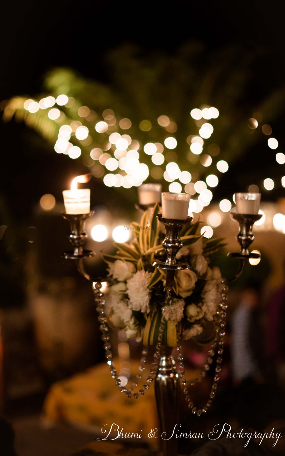 Photo of Candle stand corner wedding decor