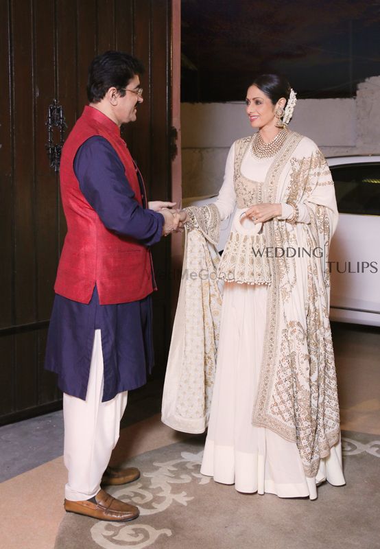 Photo of Sridevi at wedding wearing white and gold peplum lehenga