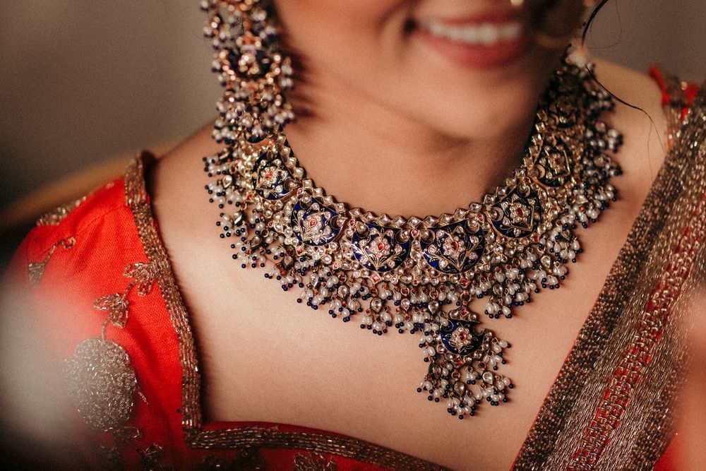 Photo of simple bridal jewellery with enamel work necklace