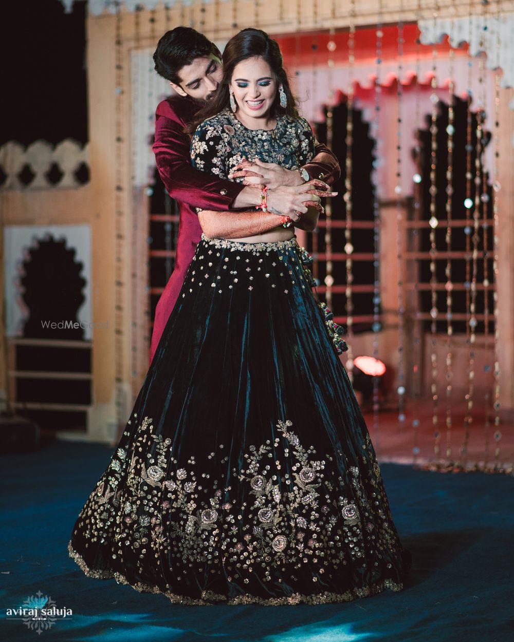 Photo of Black velvet reception lehenga with grey embroidery