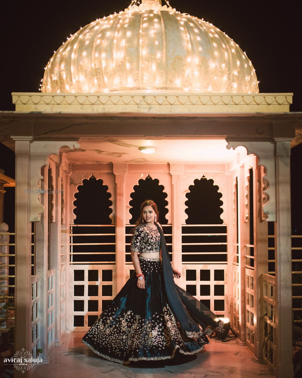 Photo of Black reception lehenga with gold motifs