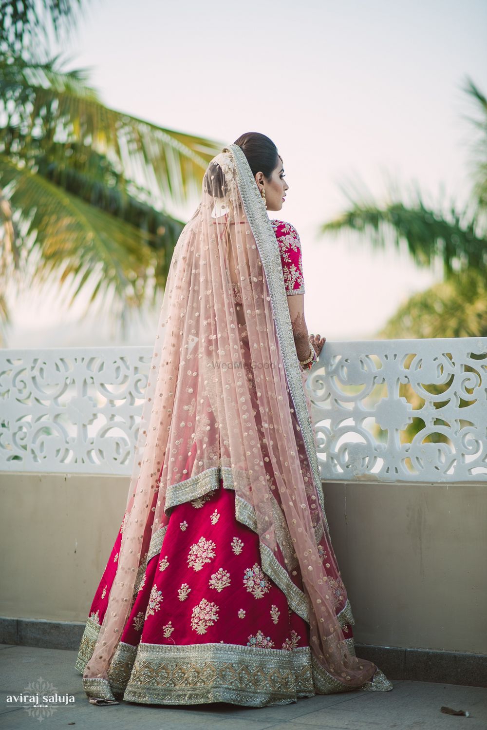 Photo of Bride back shot with light pink dupatta