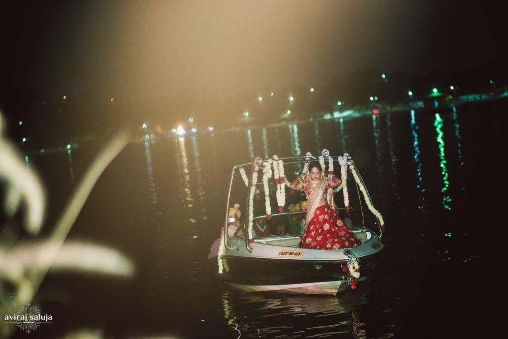 Photo of Unique bridal entry with bride entering on a boat