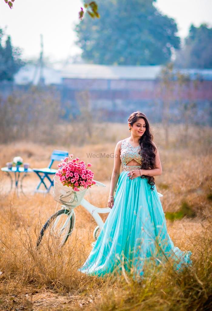 Photo of Turquoise cut out gown for engagement