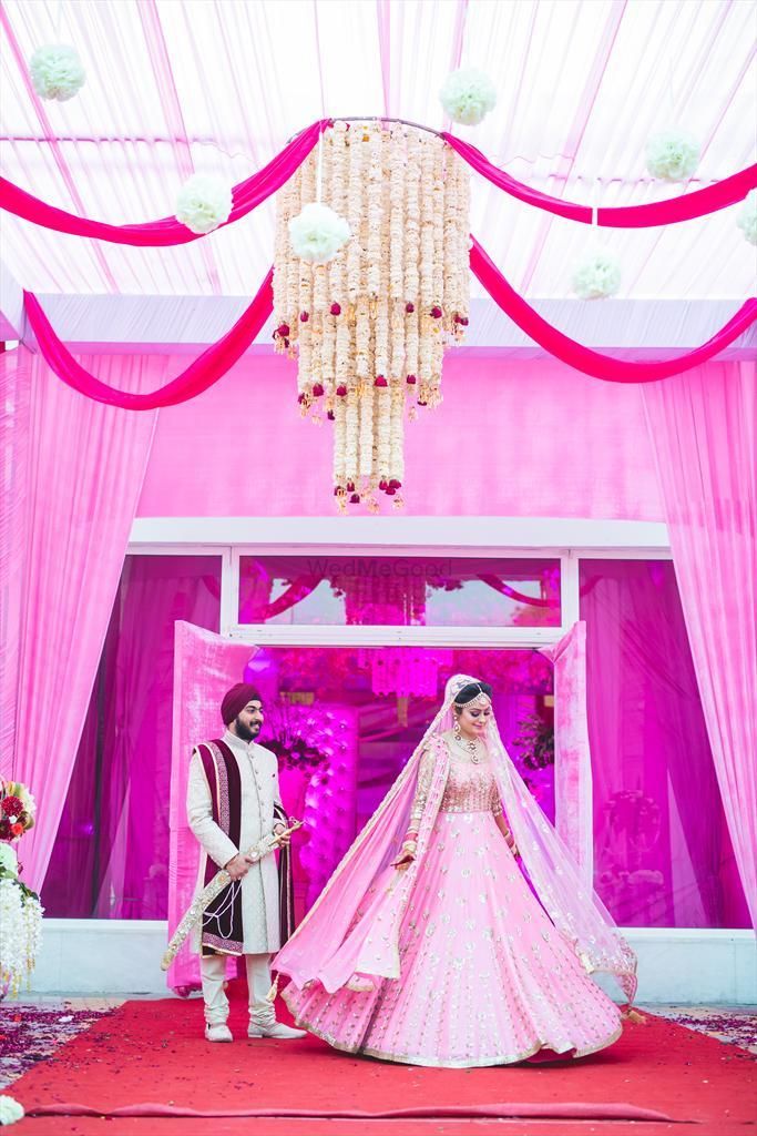 Photo of Morning wedding sikh bride in light pink lehenga and pink decor