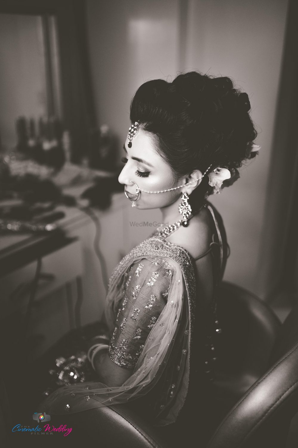 Photo of Black and white photography bridal portrait while getting ready