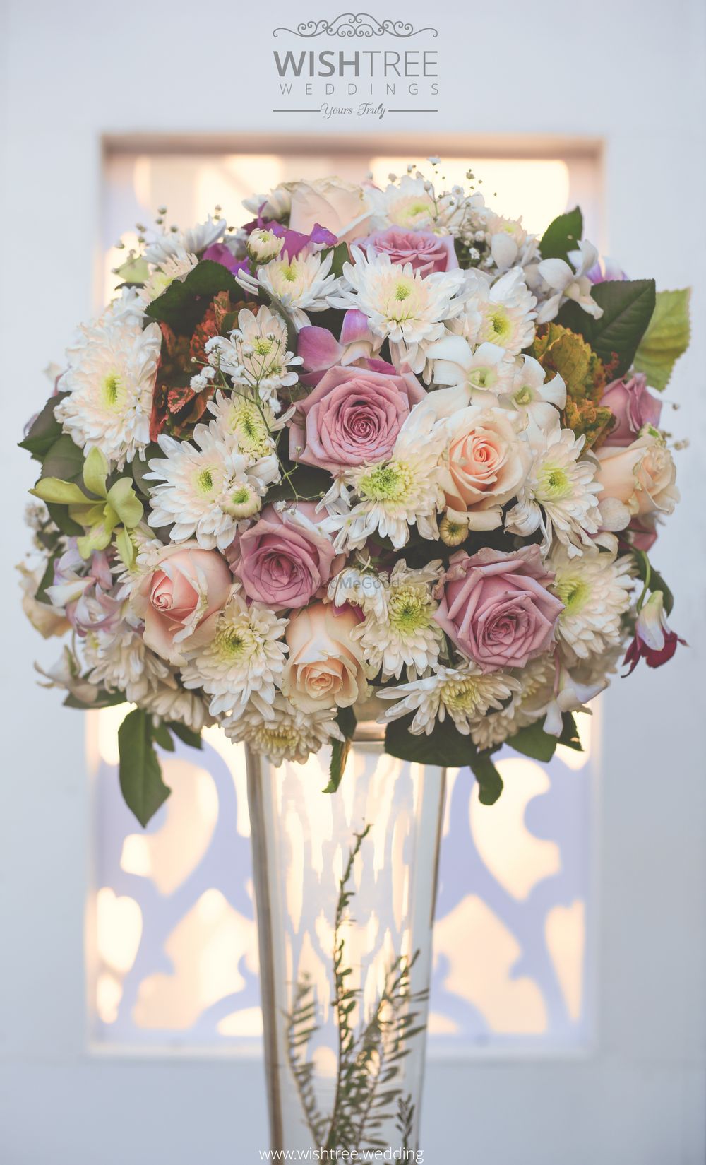 Photo of Floral vase centerpiece with white and pink flowers