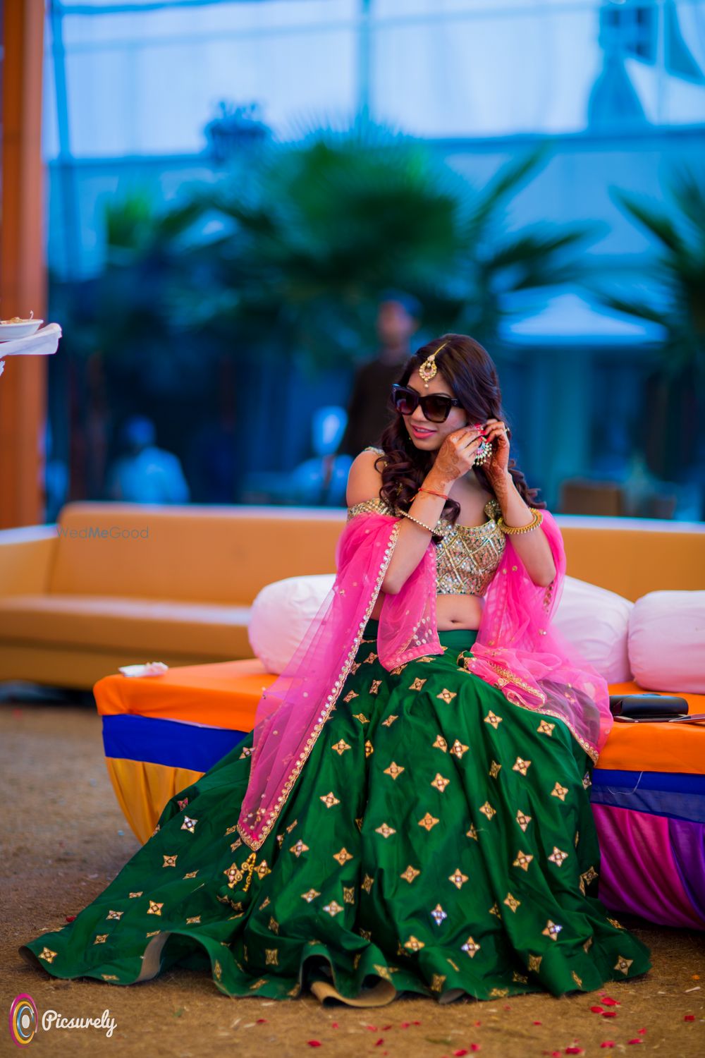 Photo of Lehenga for mehendi with green skirt and pink dupatta