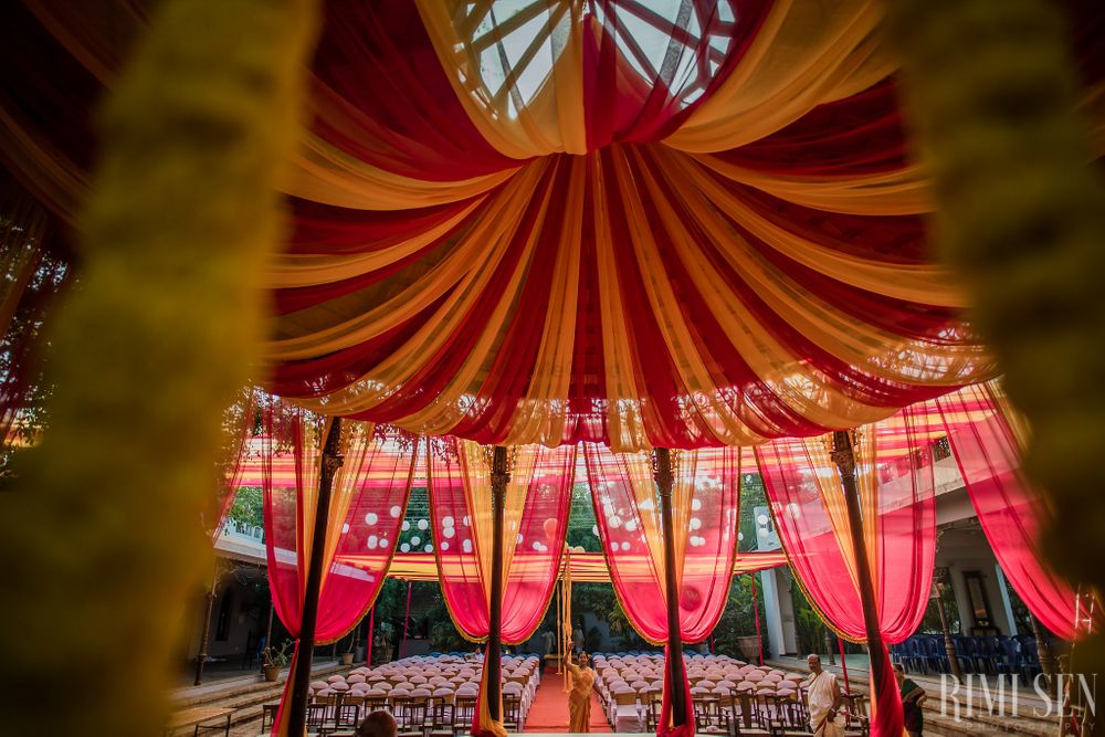 Photo of South Indian Wedding Pink and Yellow Canopy tents decor