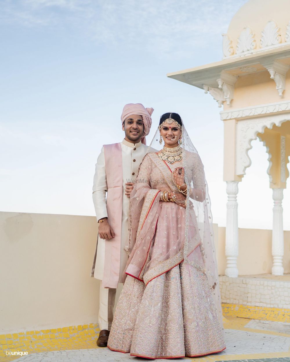 Photo of A lovely couple colour-coordinating in pink.