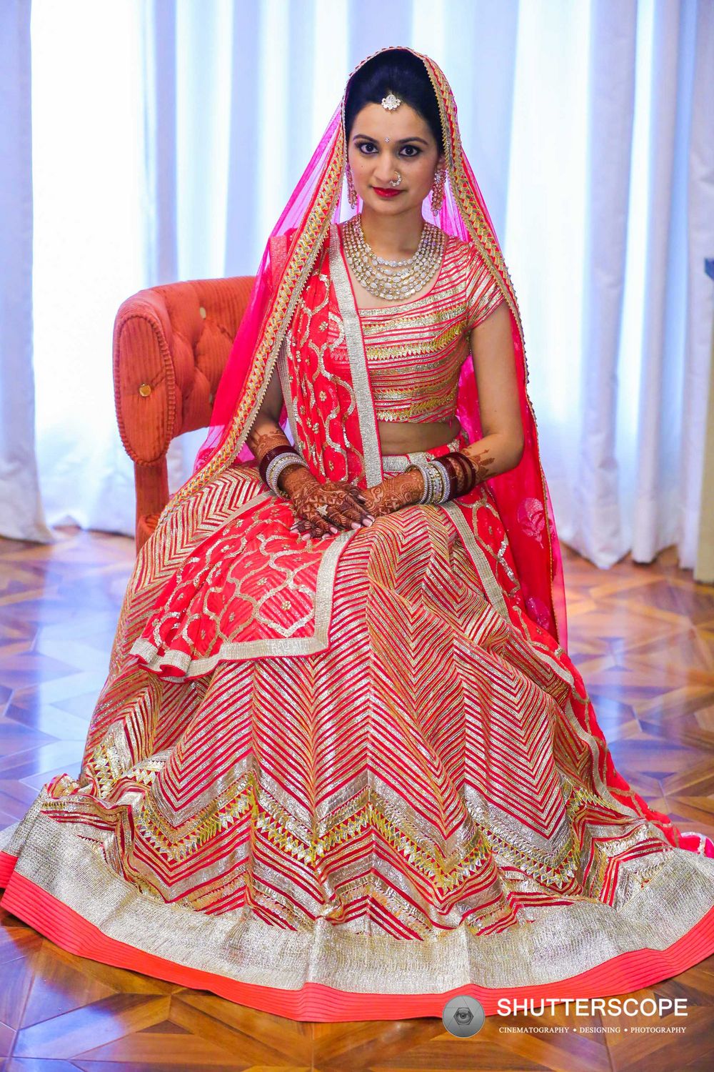 Photo of Neon pink bridal lehengas with gold and silver work