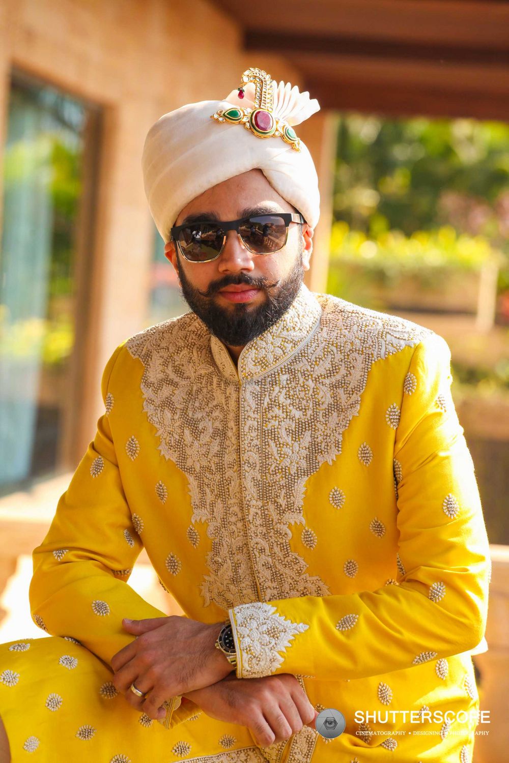 Photo of Groom in yellow sherwani for summer wedding