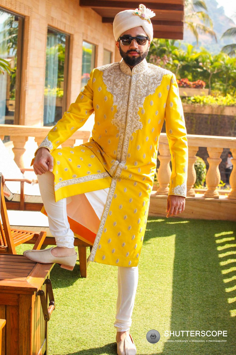Photo of Yellow embroidered sherwani for summer wedding