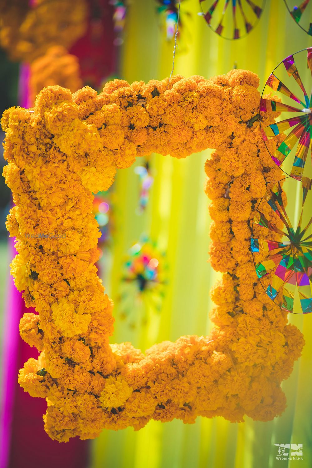 Photo of Genda phool Photo Booth frame for mehendi