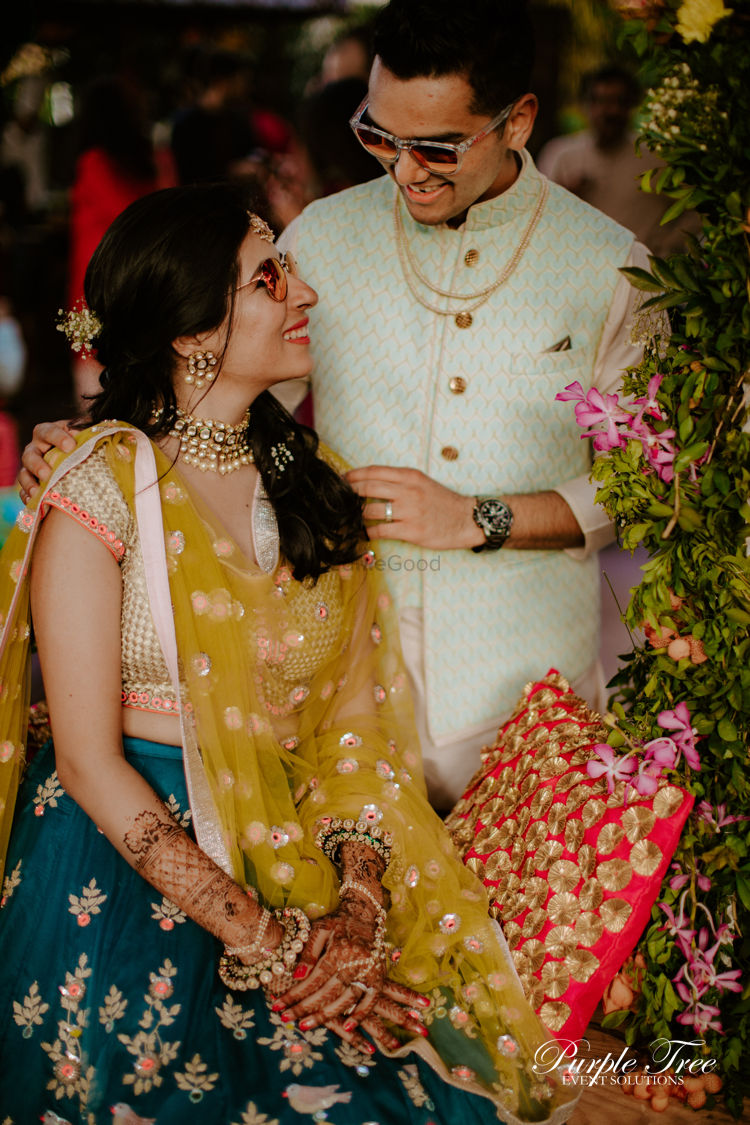 Photo of An adorable couple portrait from their mehendi.