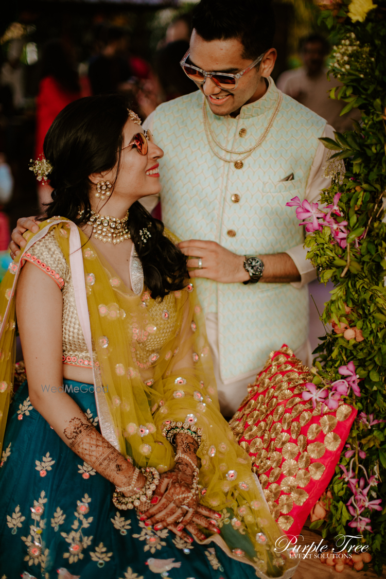 Photo of An adorable couple portrait from their mehendi.