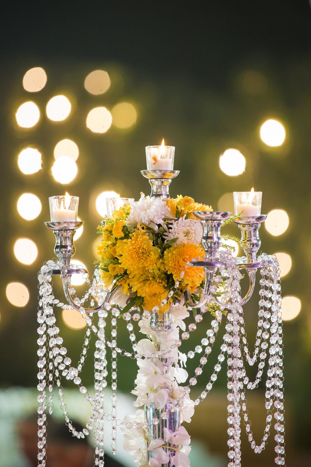 Photo of Centrepiece with candles and flowers
