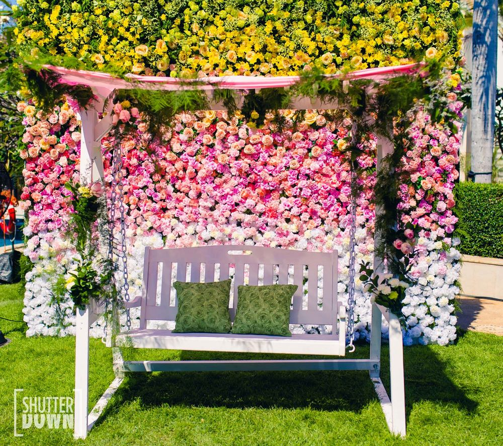 Photo of Floral wall Photo Booth with swing on mehendi