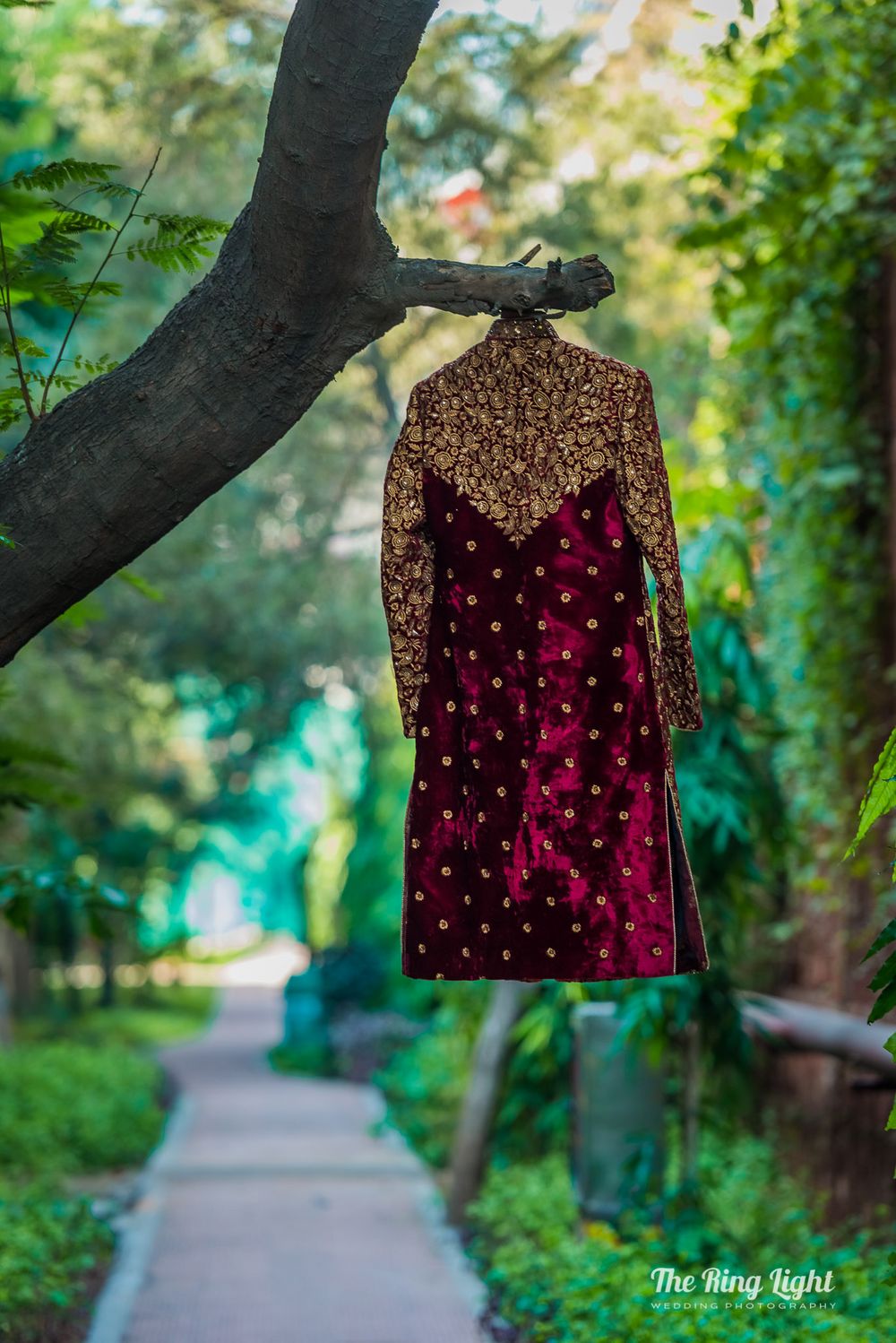 Photo of Embroidered velvet sherwani on hanger