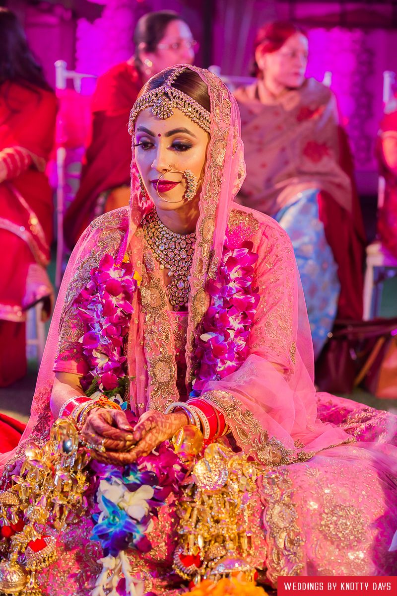 Photo of Bridal portrait during wedding wearing vintage nath