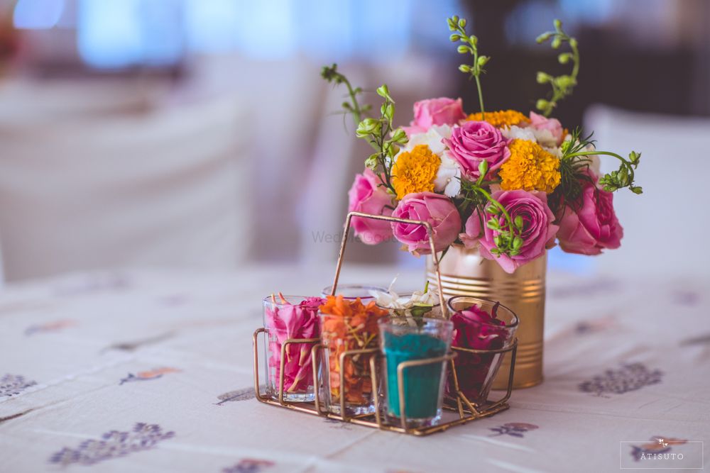Photo of Colorful flowers in brass vase