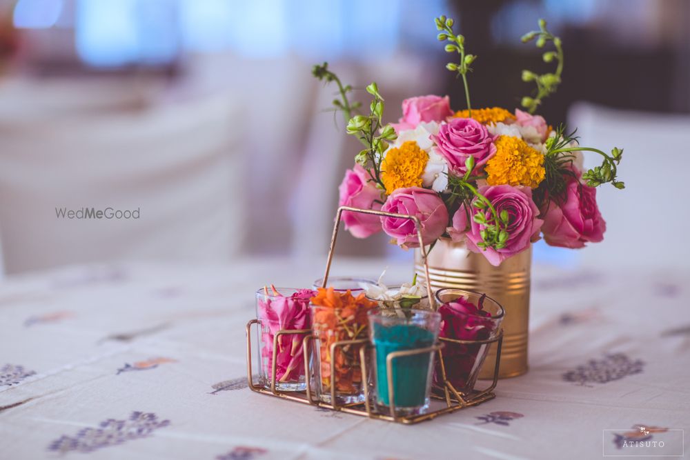 Photo of Colorful flowers in brass vase