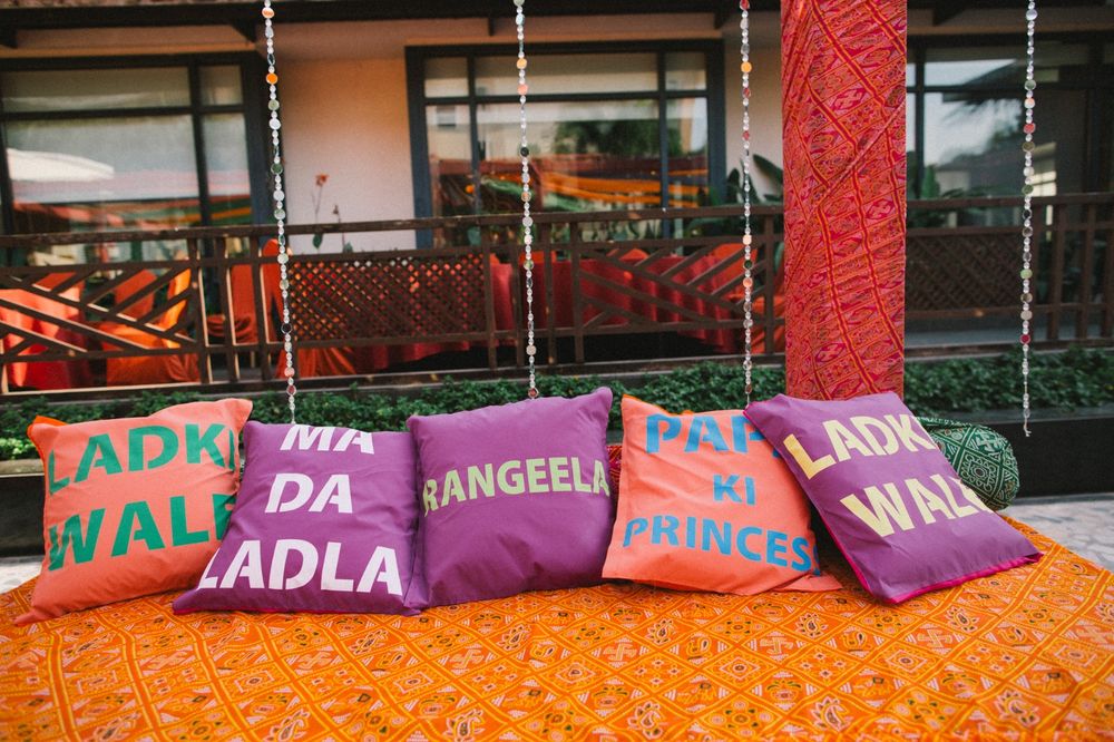 Photo of Colourful cushions with sayings for mehendi decor