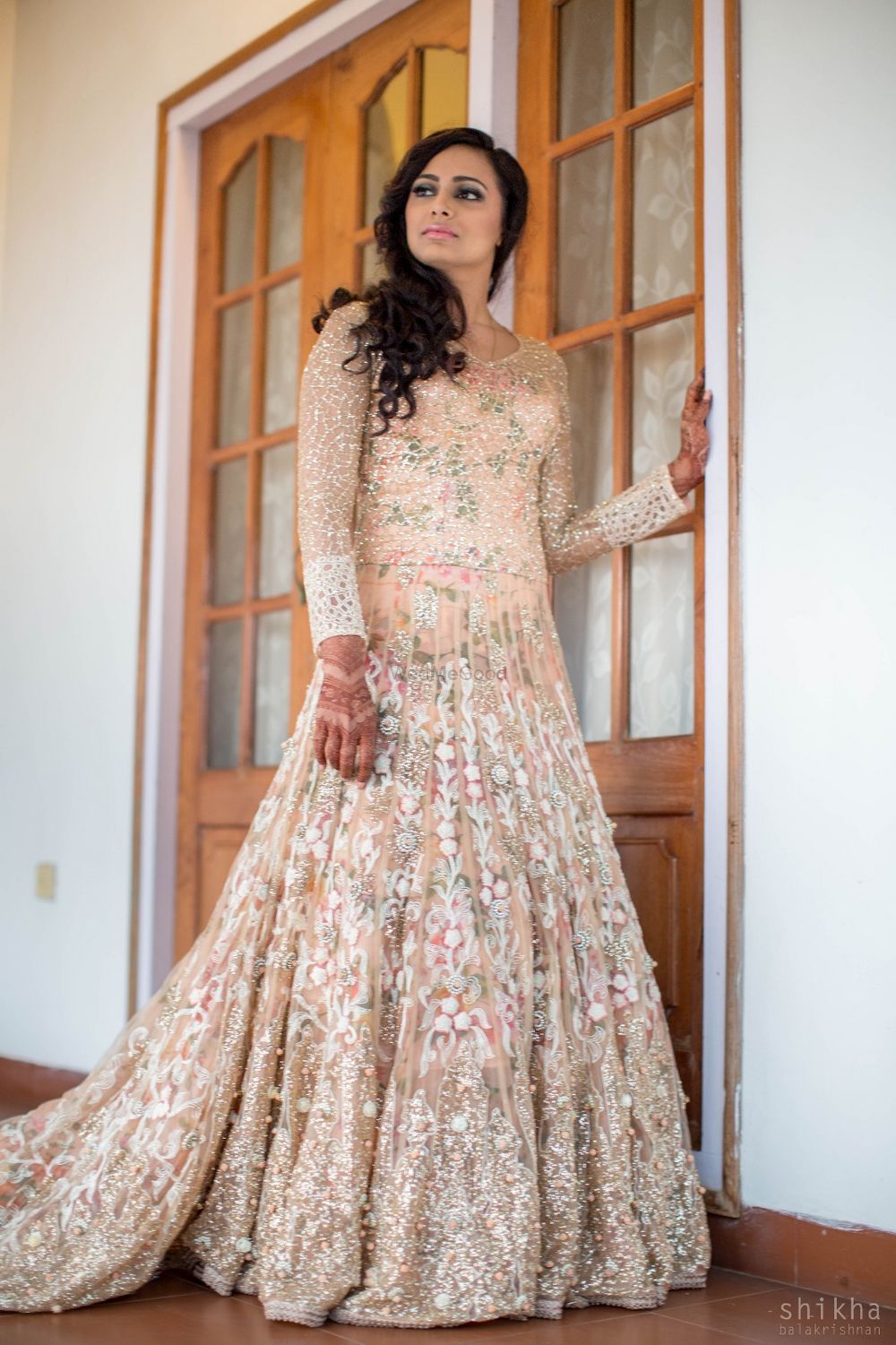 Photo of Peach engagement gown with floral embellishment