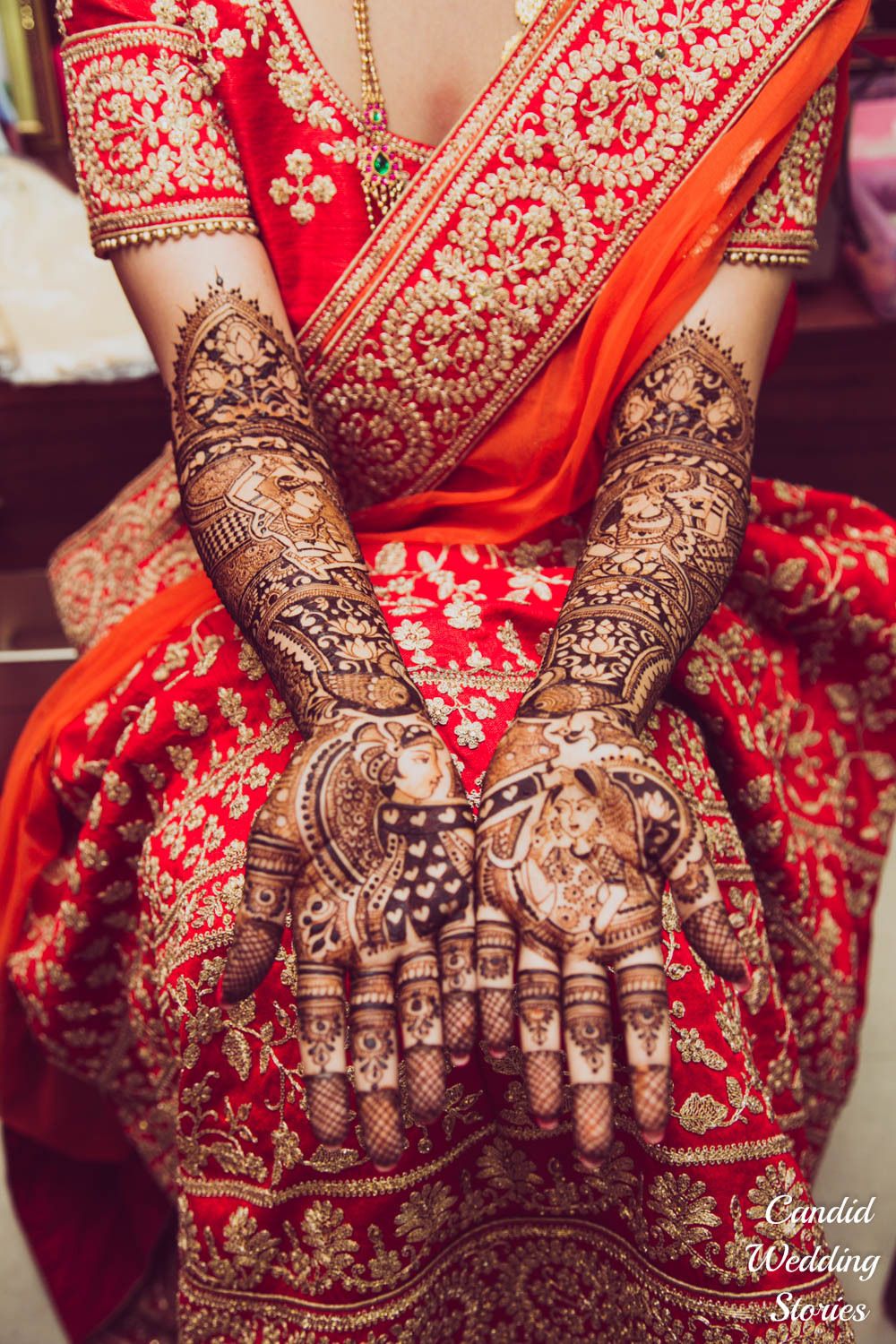 Photo of Bridal mehendi with half and half design with bride and groom portraits